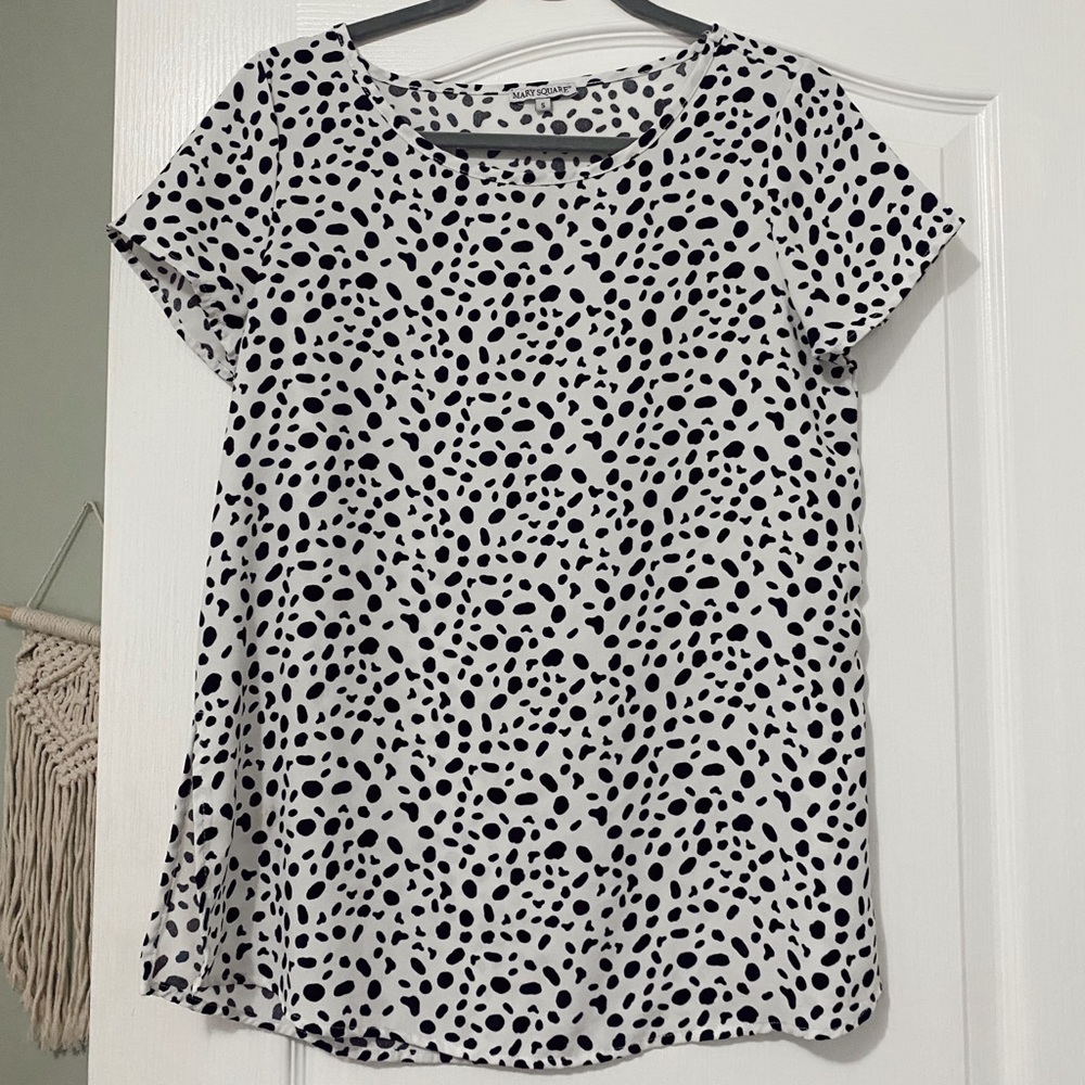 Black and White blouse, fits longer but can be tucked in super cute